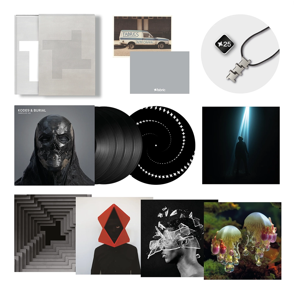 All of the added extras in the deluxe edition, including an LP and prints.